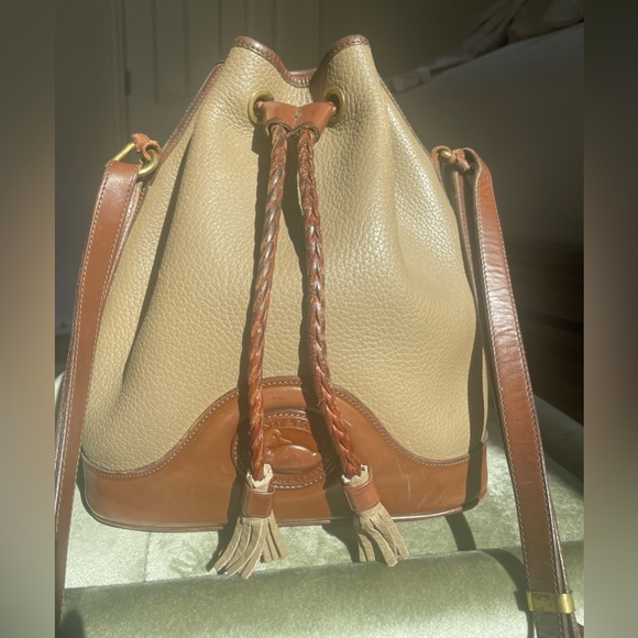 90's Classic Taupe Braided Drawstring Bucket Bag by Dooney & Burke main image 1